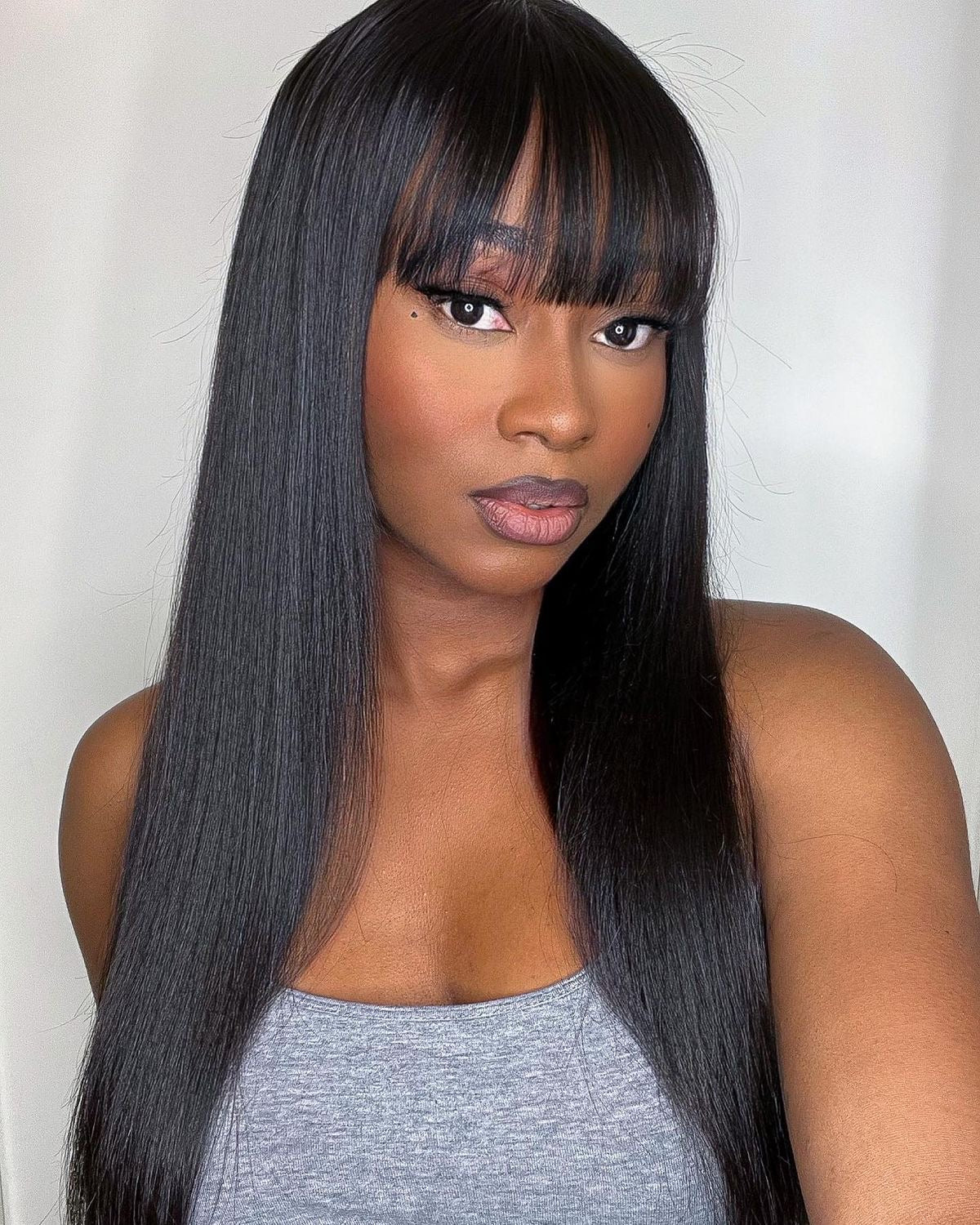 Cabelo liso com franja