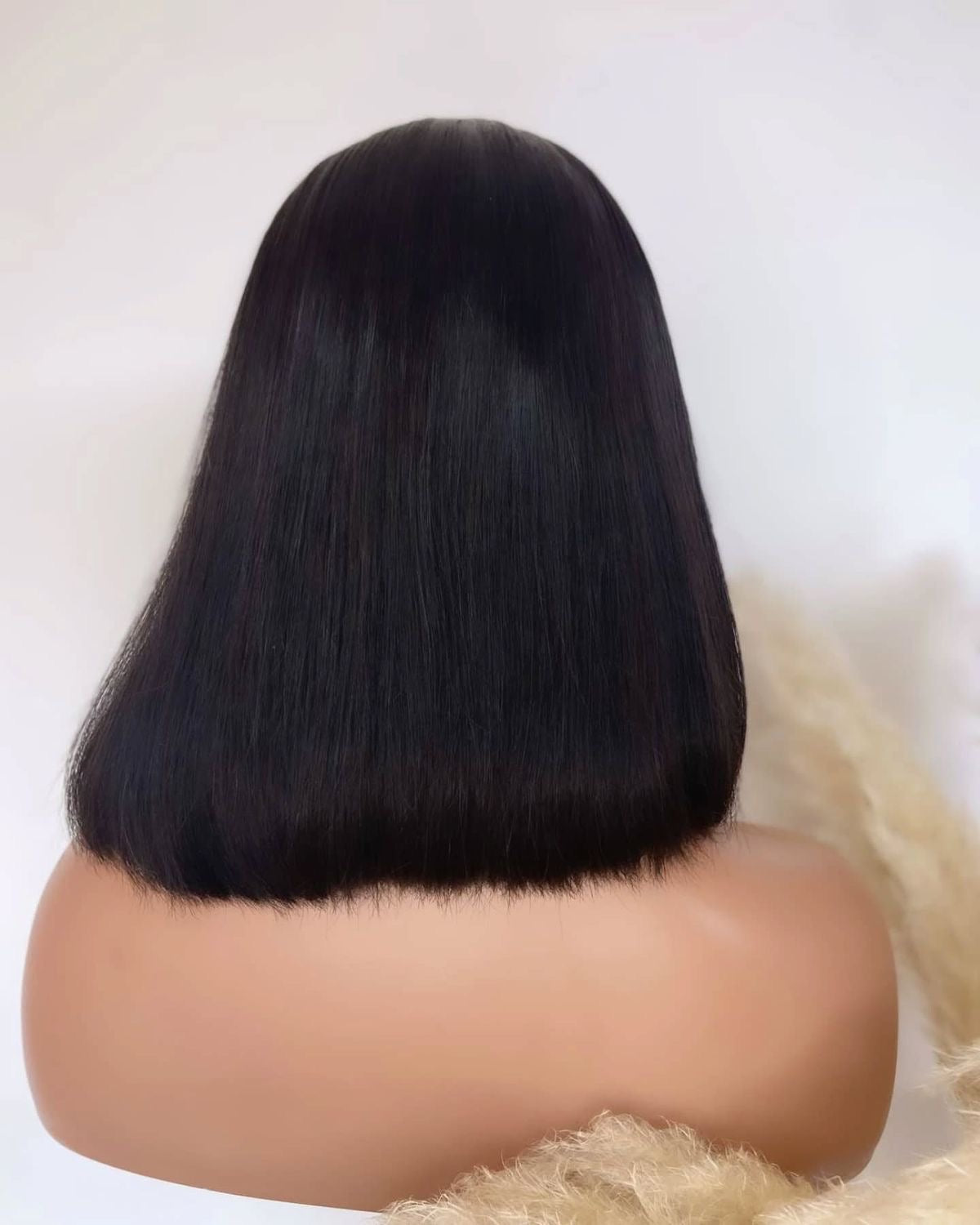 Peruca curta com franja
